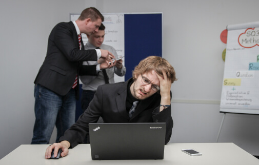 Man works at a laptop